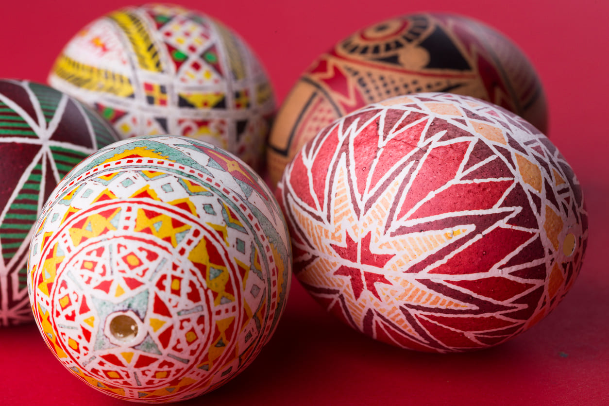 Intricately patterned Easter eggs in vibrant colors, showcasing traditional Orthodox artistry and symbolism.