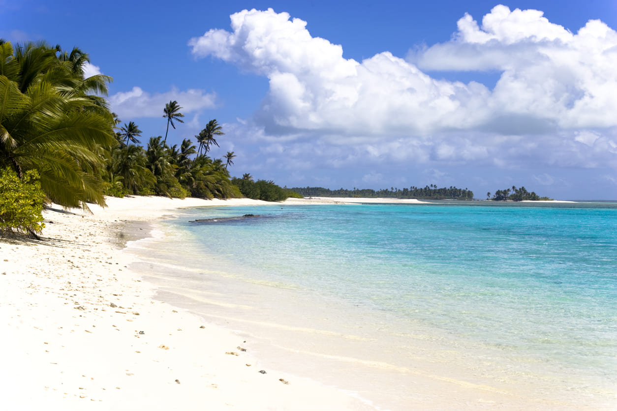 The serene beauty of the Cocos (Keeling) Islands, showcasing its pristine beaches and vibrant natural landscape.