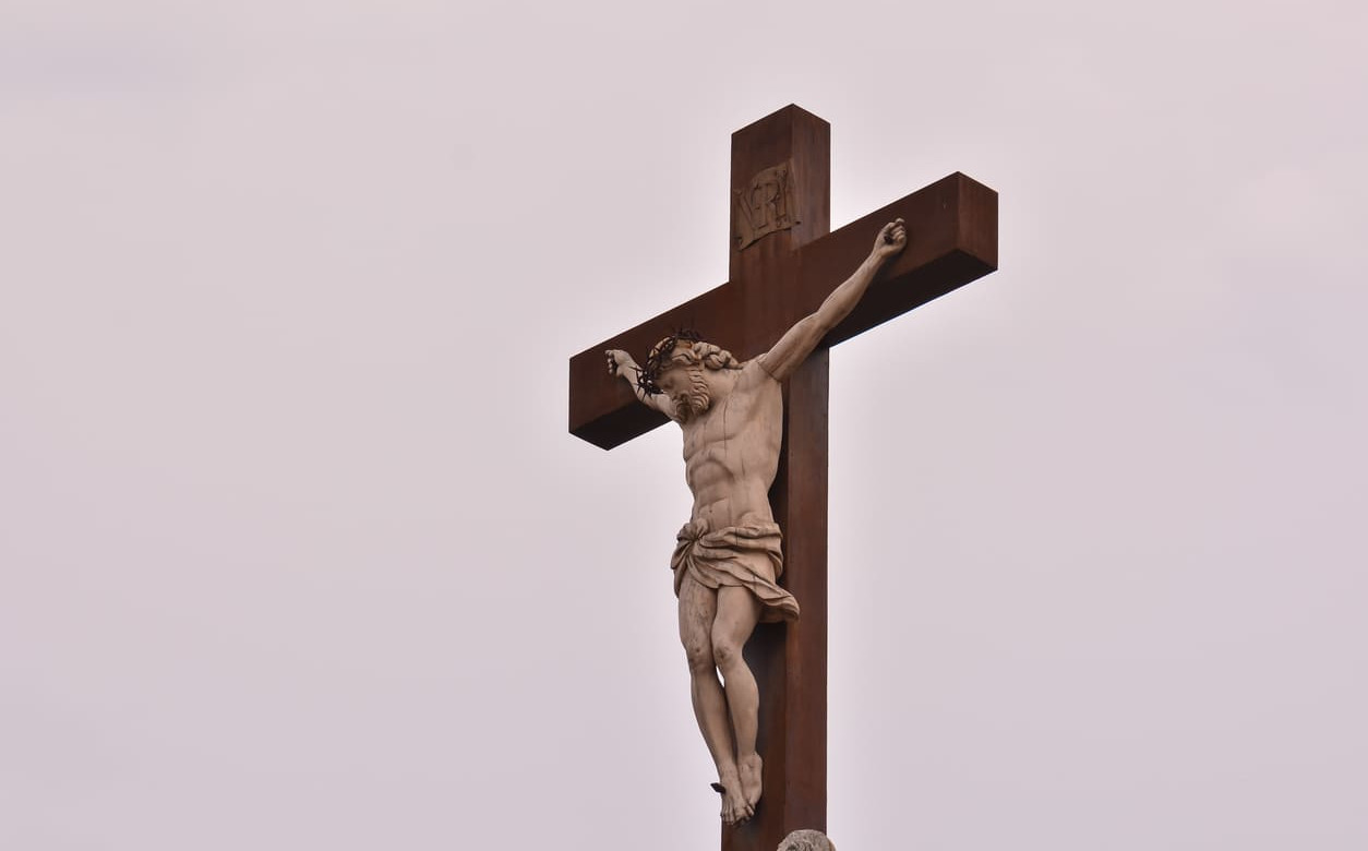 A statue of Jesus Christ on the cross, capturing the solemn moment of his crucifixion remembered on Good Friday.
