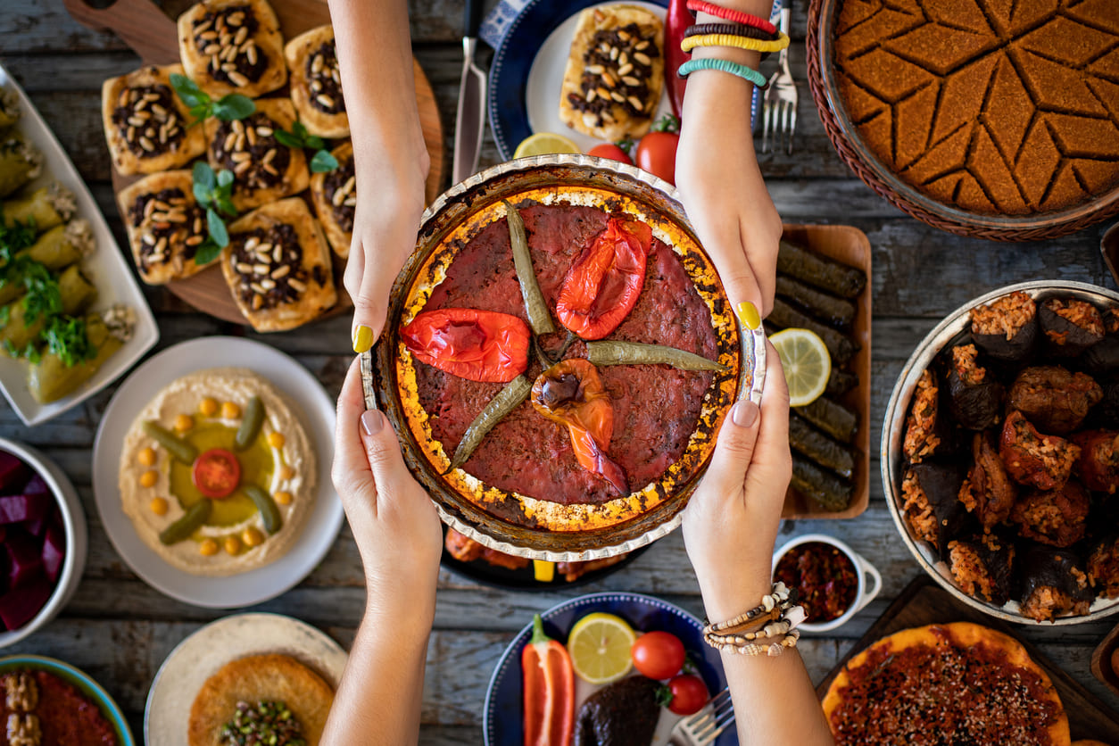 A beautifully arranged Eid al-Fitr feast featuring traditional dishes, symbolizing celebration, generosity, and togetherness.