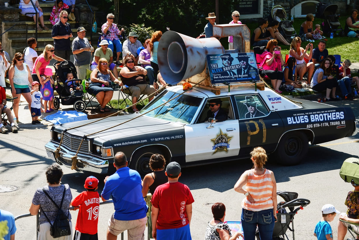 The annual Natal Day Parade in Halifax, Nova Scotia, features vibrant floats, enthusiastic crowds, and a festive community atmosphere.