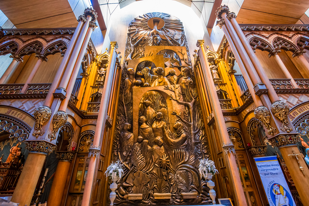 An intricate artwork inside Notre-Dame Basilica, Montreal, illustrating the descent of the Holy Spirit, a central event in the celebration of Pentecost.