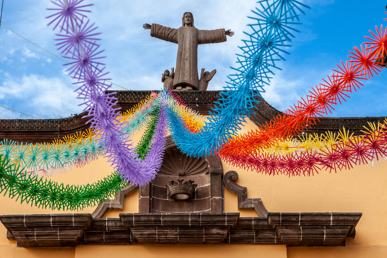 A church in Mexico adorned with vibrant decorations, symbolizing the celebration of Ascension Day.