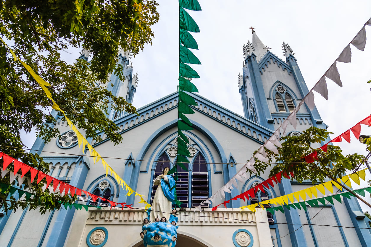 A Marian church in Palawan, Philippines, beautifully decorated with colorful buntings and floral displays for the Feast of the Nativity of Mary.