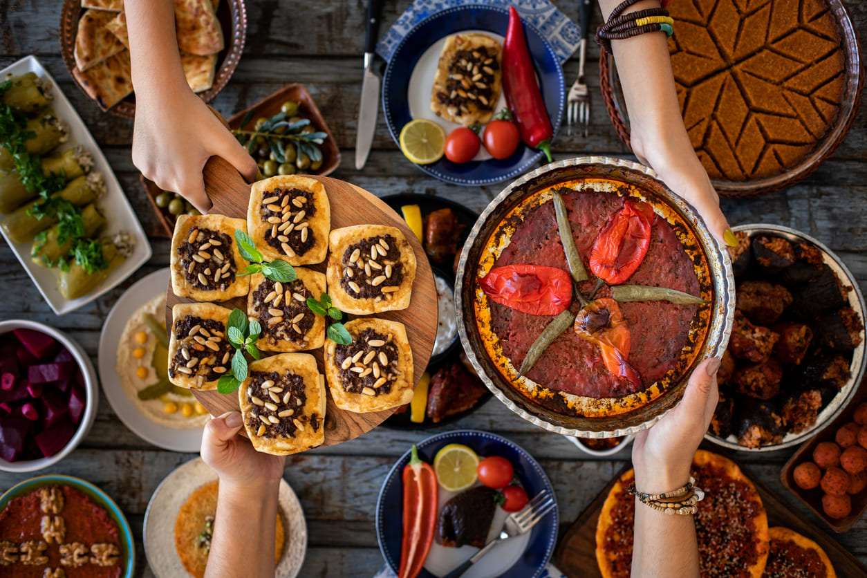 A colorful spread of traditional Middle Eastern dishes shared during Eid al-Fitr, capturing the warmth of family and festive celebration.