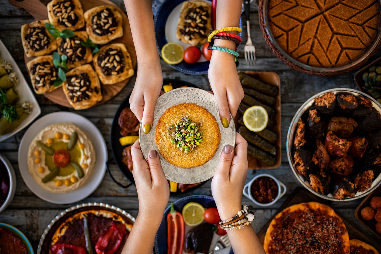 A festive Eid al-Fitr meal with a variety of traditional dishes.