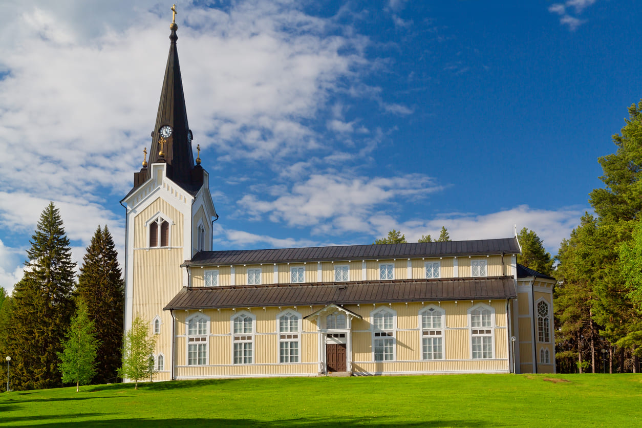 The old wooden church in Storuman, Lapland, stands quietly beneath the spring sky, offering a serene setting for Ascension Day reflection and tradition.